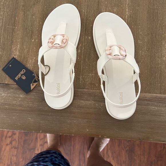 OluKai Shoes - OluKai Women's Cream Sandals with tan Accent